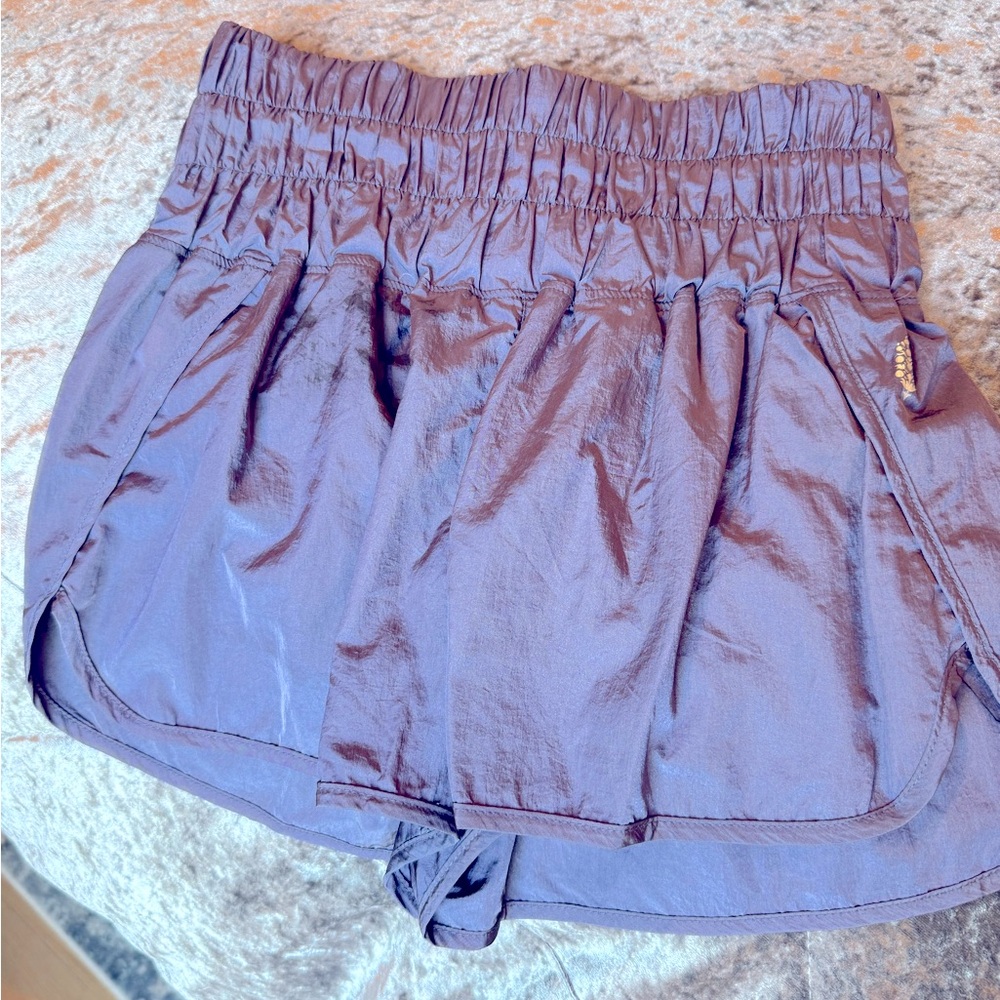 Free people movement shorts. Size small light, purple, plum color.